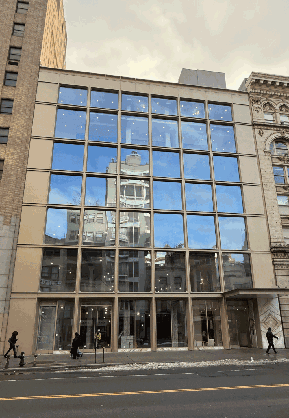 Street-level view of the 132 West 14th Street facade